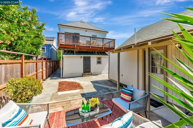 a view of a chairs and table in a patio