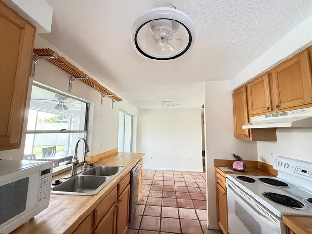 a view of a room with wooden walls