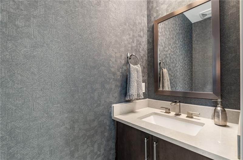 383 Pratt Drive, Unit 504 Atlanta, GA 30315 - Photo 24 of 48 a bathroom with a sink and a mirror