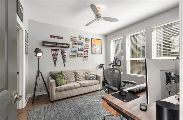 a living room with furniture and a window