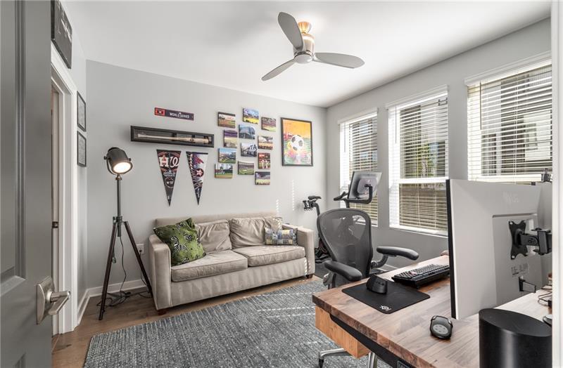 383 Pratt Drive, Unit 504 Atlanta, GA 30315 - Photo 27 of 48 a living room with furniture and a window