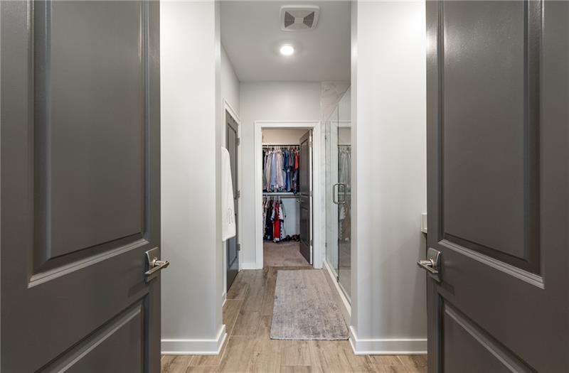 383 Pratt Drive, Unit 504 Atlanta, GA 30315 - Photo 29 of 48 a view of a hallway with wooden shelves