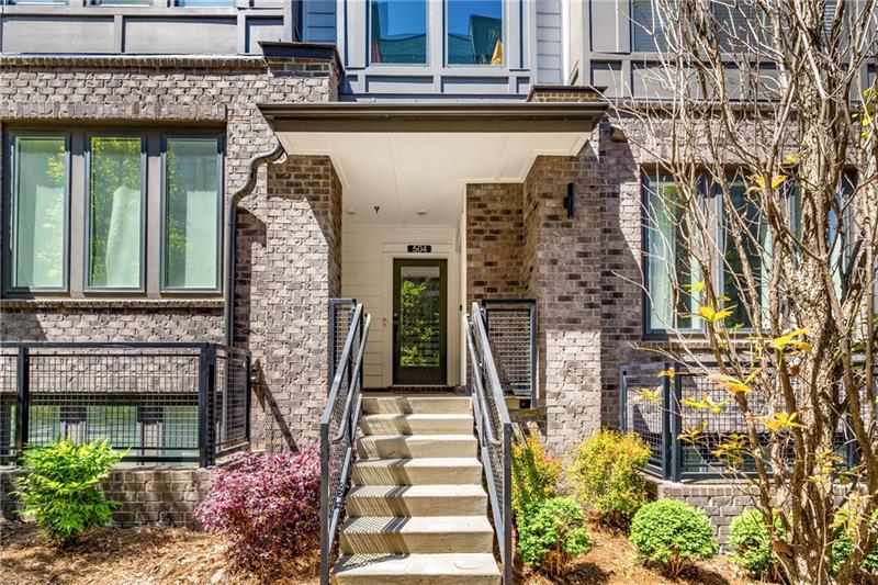 383 Pratt Drive, Unit 504 Atlanta, GA 30315 - Photo 3 of 48 a front view of a building with a garden