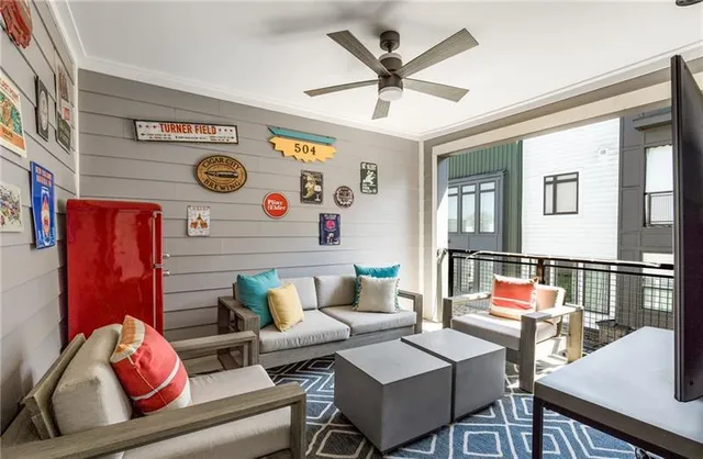 a living room with furniture and a table