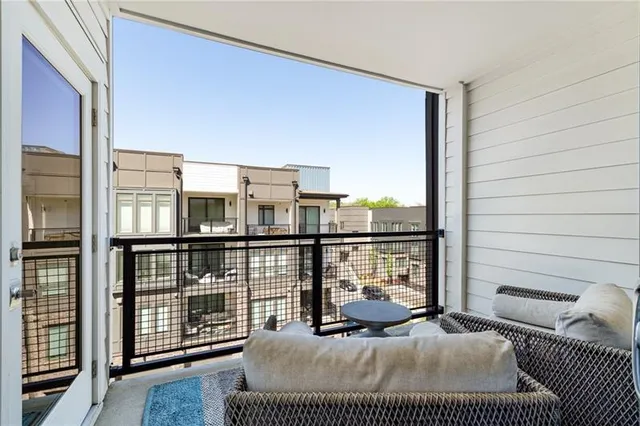 a balcony view with a couch