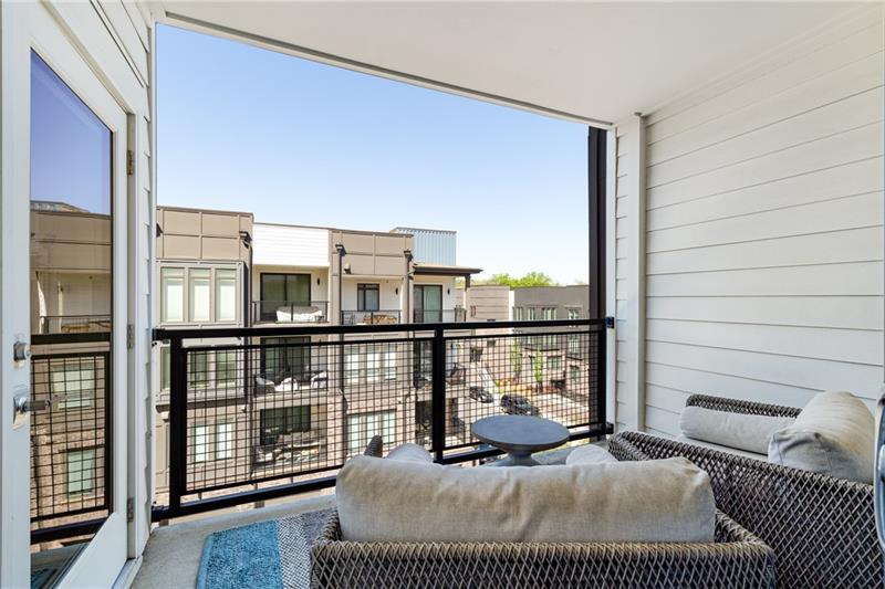 383 Pratt Drive, Unit 504 Atlanta, GA 30315 - Photo 39 of 48 a balcony view with a couch