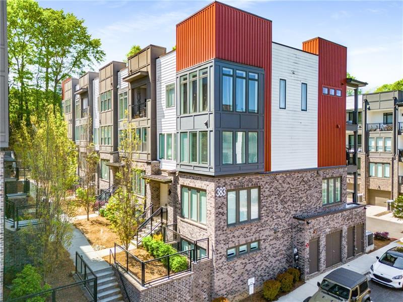 383 Pratt Drive, Unit 504 Atlanta, GA 30315 - Photo 42 of 48 a front view of a building with a garden and plants