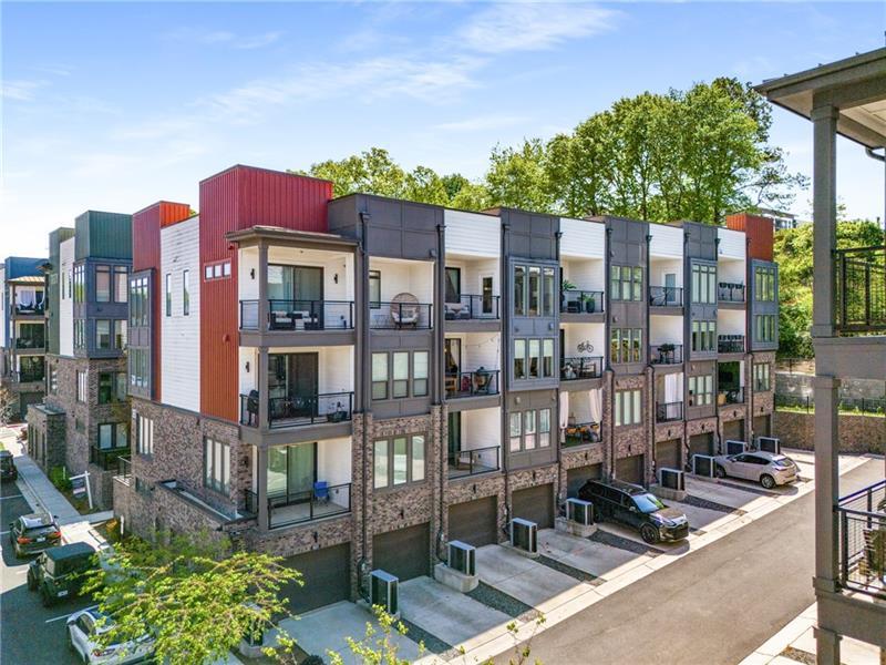 383 Pratt Drive, Unit 504 Atlanta, GA 30315 - Photo 45 of 48 a table and chairs sitting in front of a building