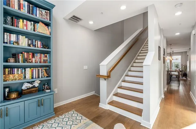 a view of entryway with workspace and stairs