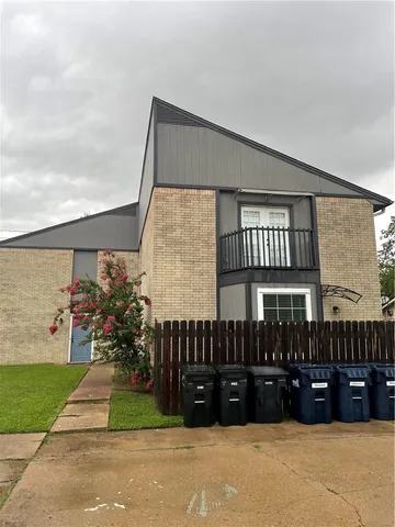 a view of a house with a patio