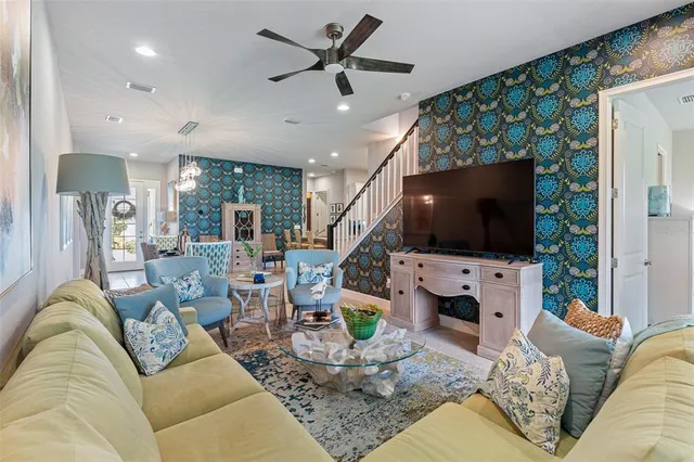 a bedroom with a bed and a mirror