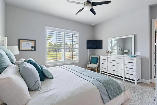 a view of entryway dining room and hall with a rug