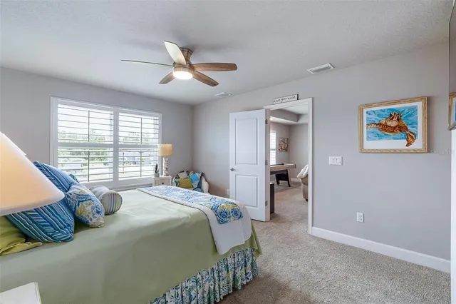 a view of a garage with parked cars