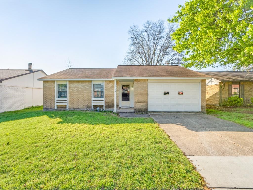 710 Sunny Slope Drive Allen, TX 75002 - Photo 1 of 1 front view of a house with a yard