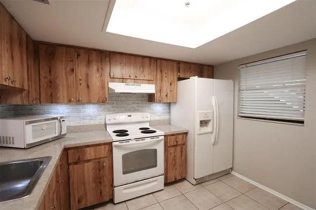 $1,495 | 4957 Puritan Circle, Unit 403, Tampa, FL 33617