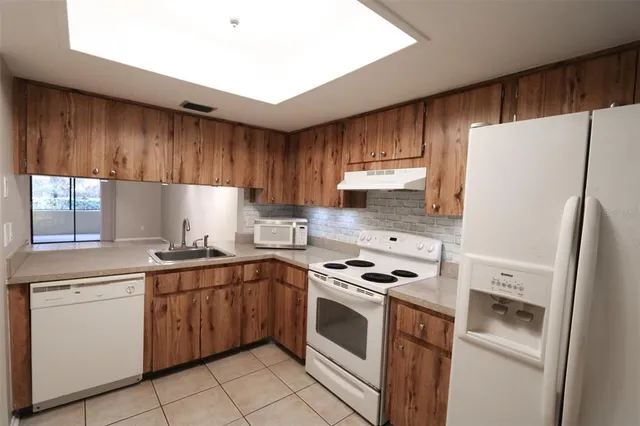 $1,495 | 4957 Puritan Circle, Unit 403, Tampa, FL 33617