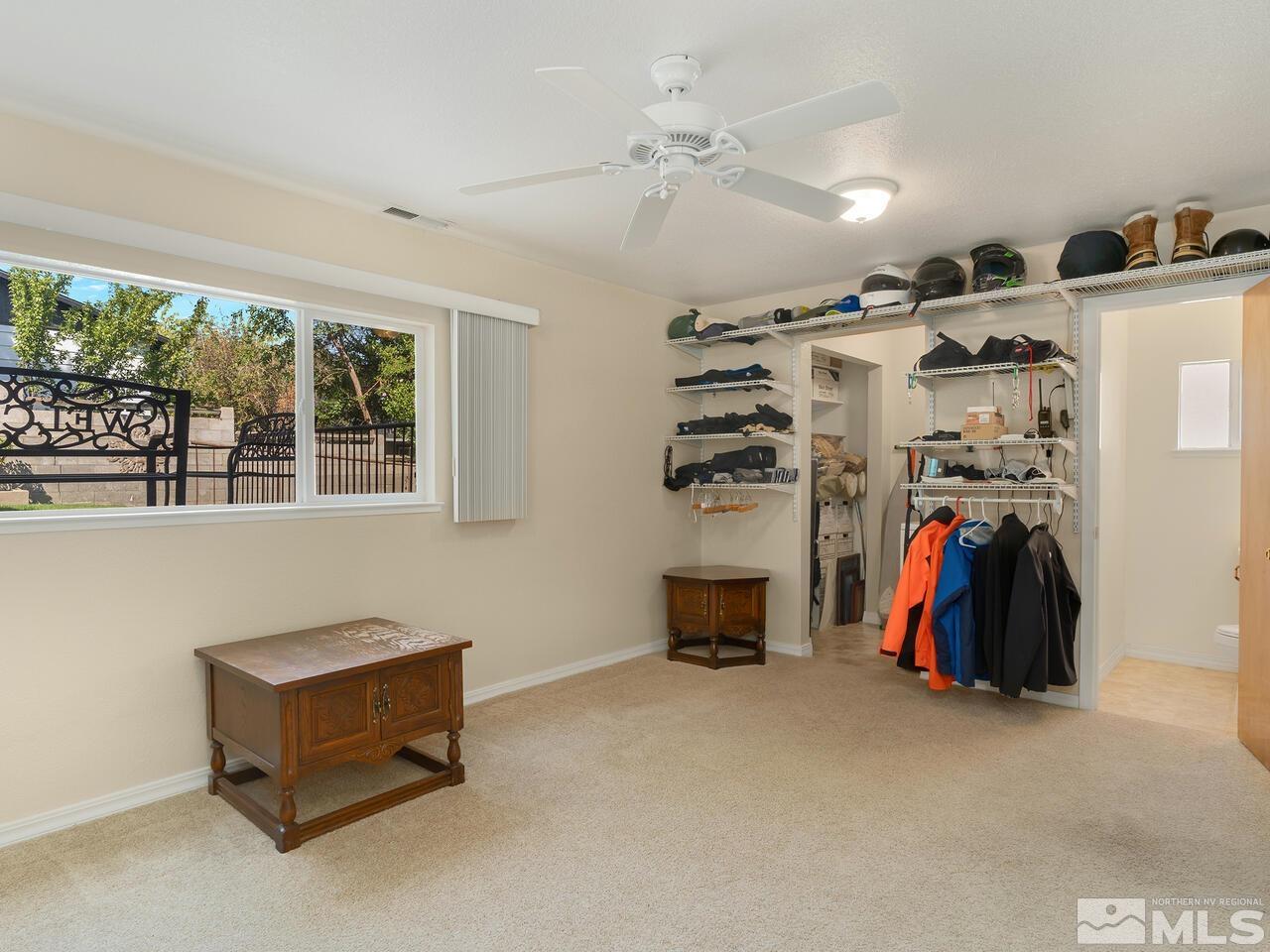 2785 Edgewood Drive Reno, NV 89503 - Photo 12 of 26 a living room with furniture and a gym machine
