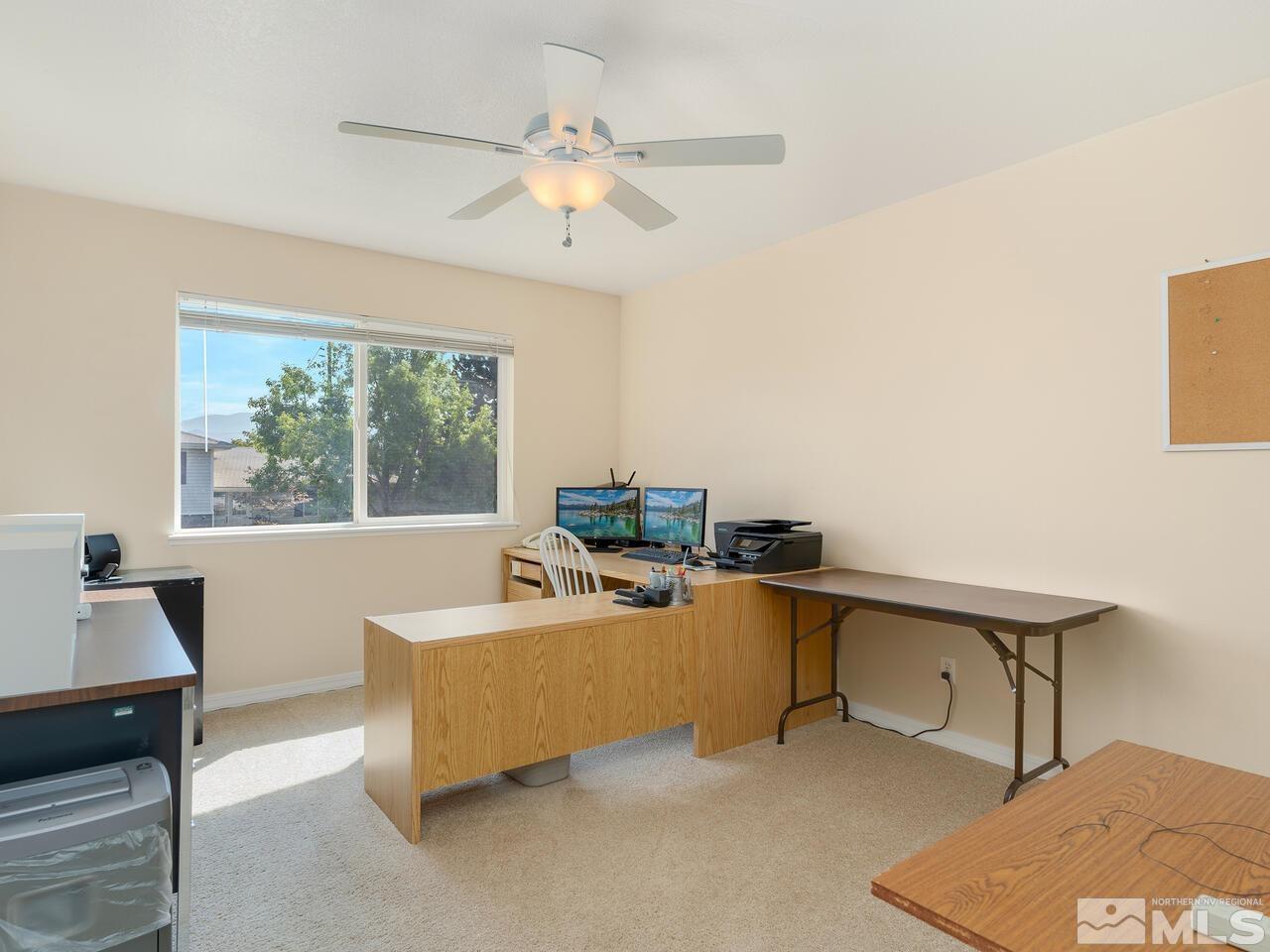 2785 Edgewood Drive Reno, NV 89503 - Photo 20 of 26 a living room with furniture and a window