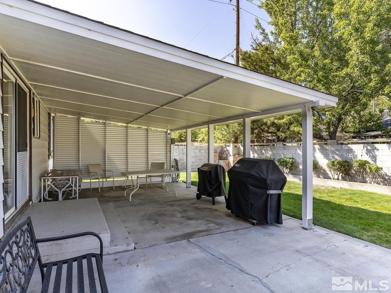 2785 Edgewood Drive Reno, NV 89503 - Photo 22 of 26 a view of a porch with chairs and floor