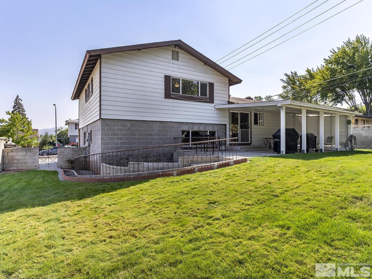 2785 Edgewood Drive Reno, NV 89503 - Photo 25 of 26 a view of a house with a backyard