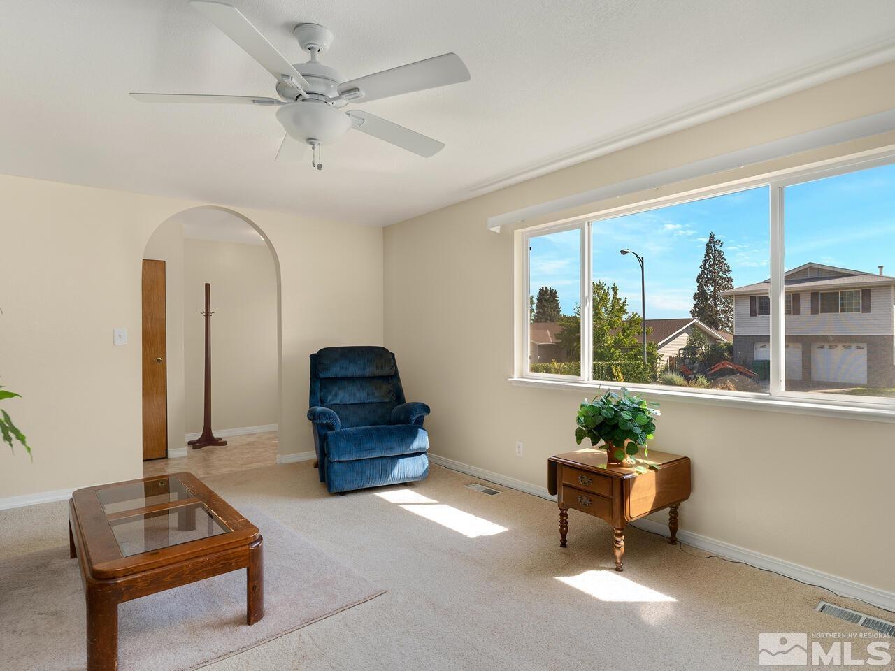 2785 Edgewood Drive Reno, NV 89503 - Photo 5 of 26 a living room with furniture and a potted plant