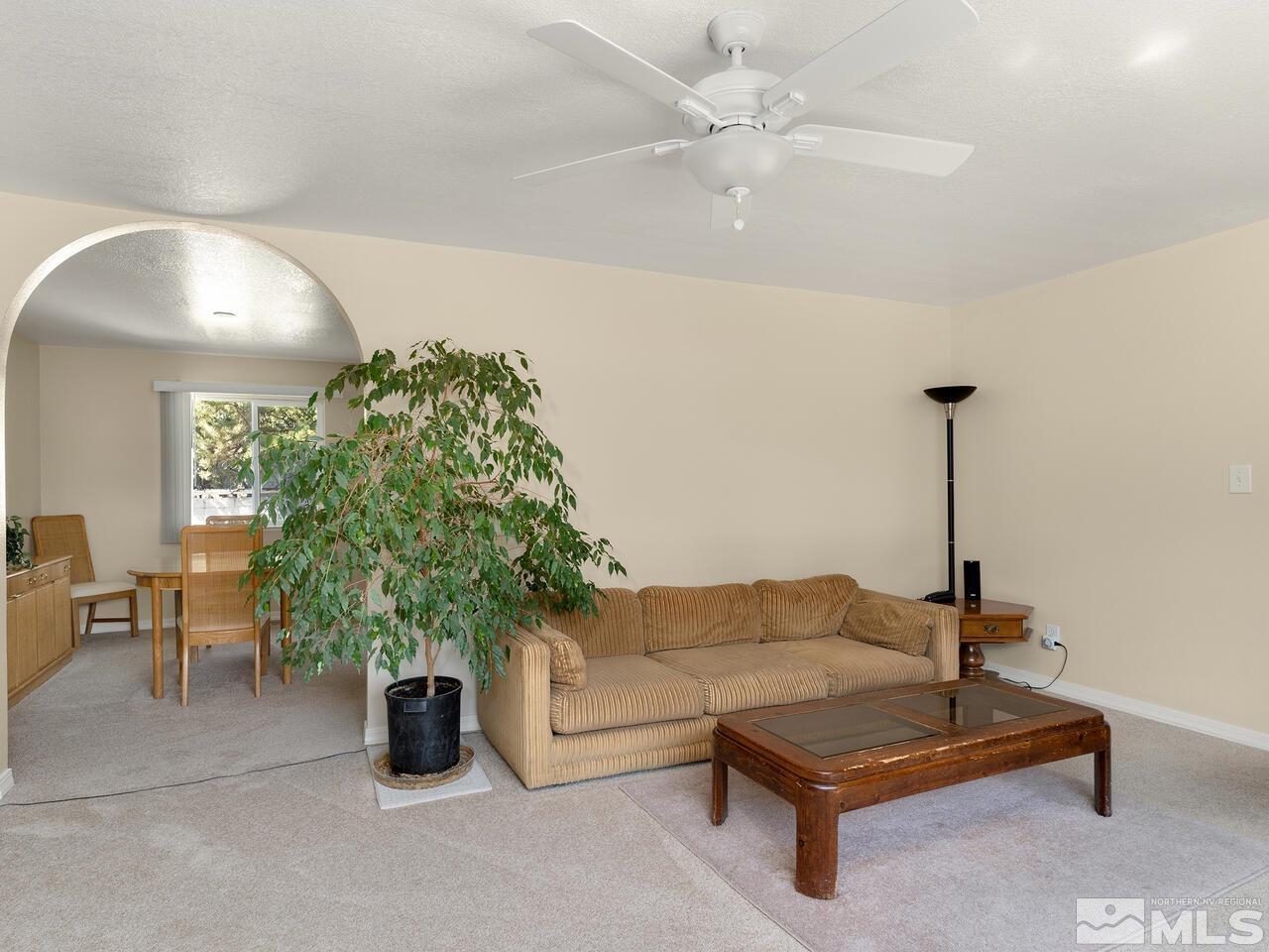 2785 Edgewood Drive Reno, NV 89503 - Photo 6 of 26 a living room with furniture and a potted plant