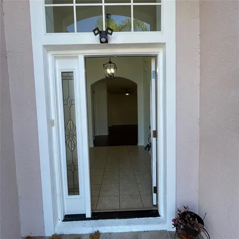 an empty room with wooden floor
