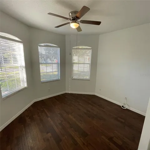 a view of gallery with wooden floor