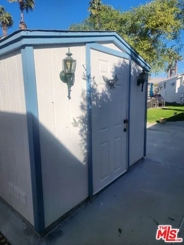 a view of a back yard from a balcony