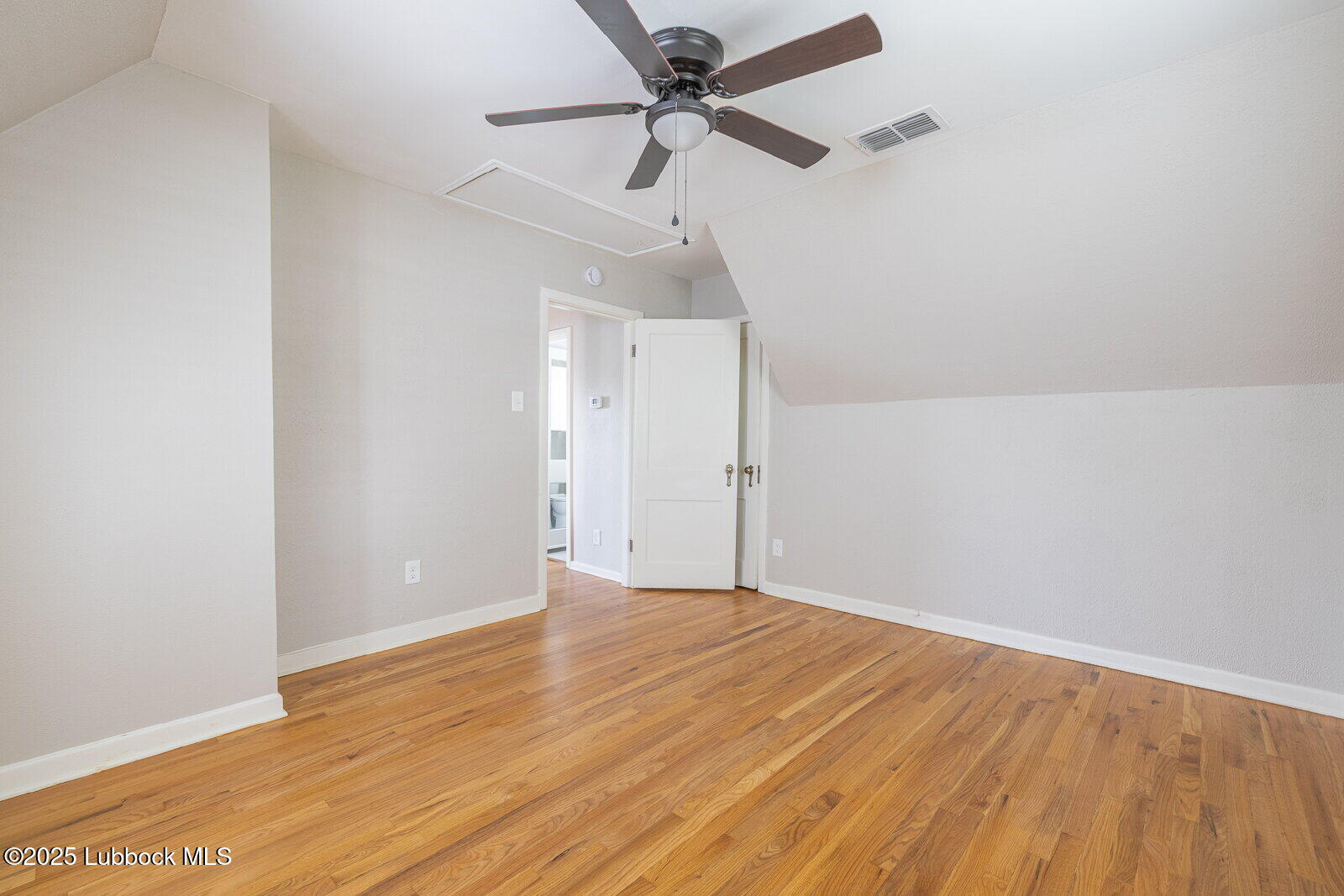 2614 24th Street Lubbock, TX 79410 - Photo 23 of 46 a view of an empty room with a window