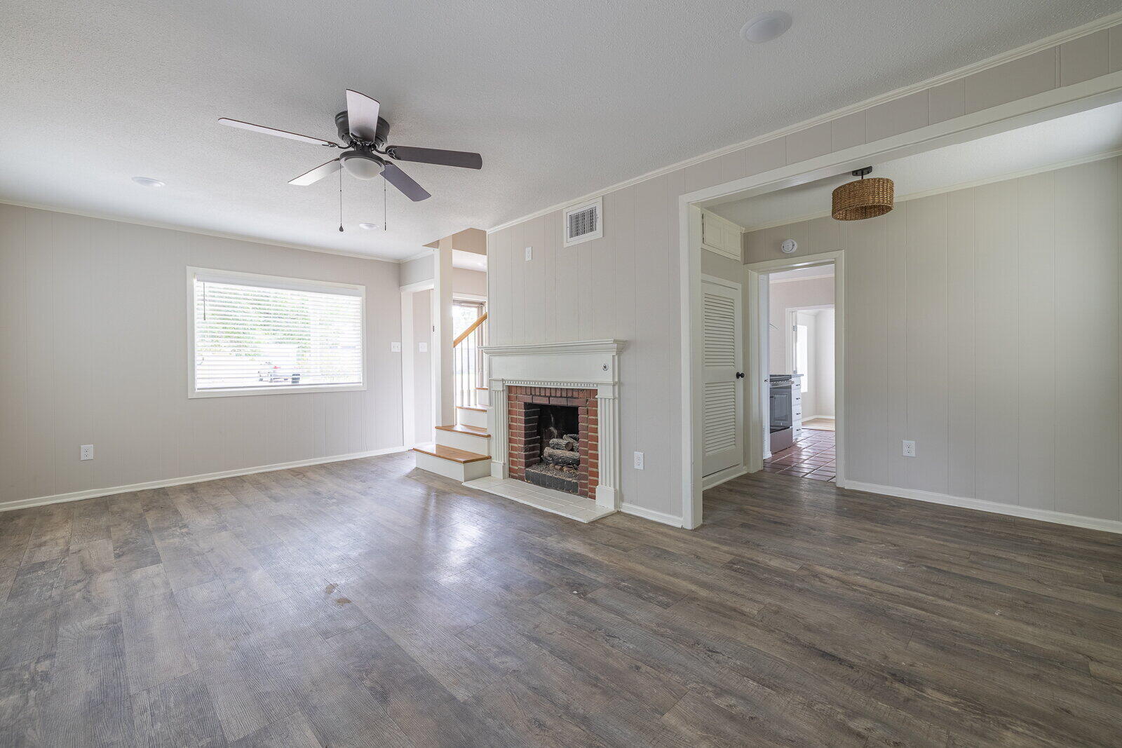 2614 24th Street Lubbock, TX 79410 - Photo 27 of 46 a view of an empty room with a window and fireplace