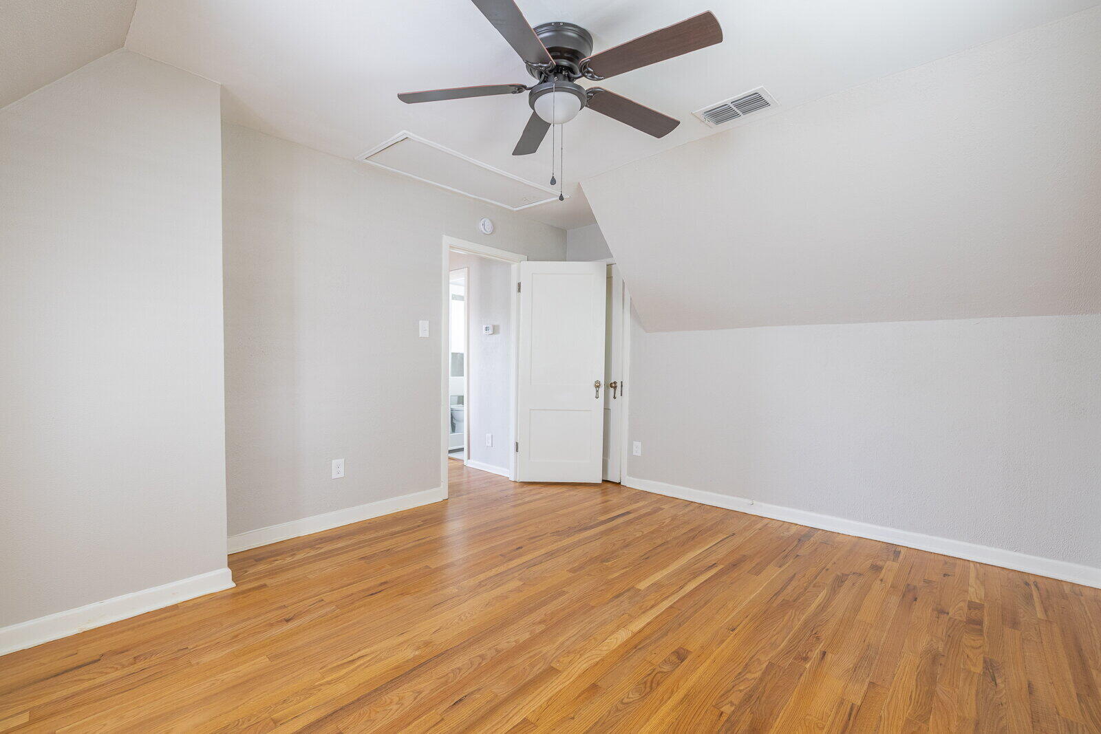 2614 24th Street Lubbock, TX 79410 - Photo 43 of 46 a view of an empty room with a fan