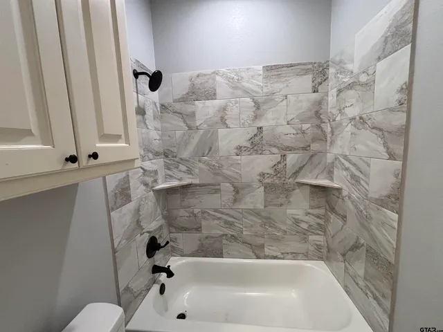 a bathroom with a bathtub