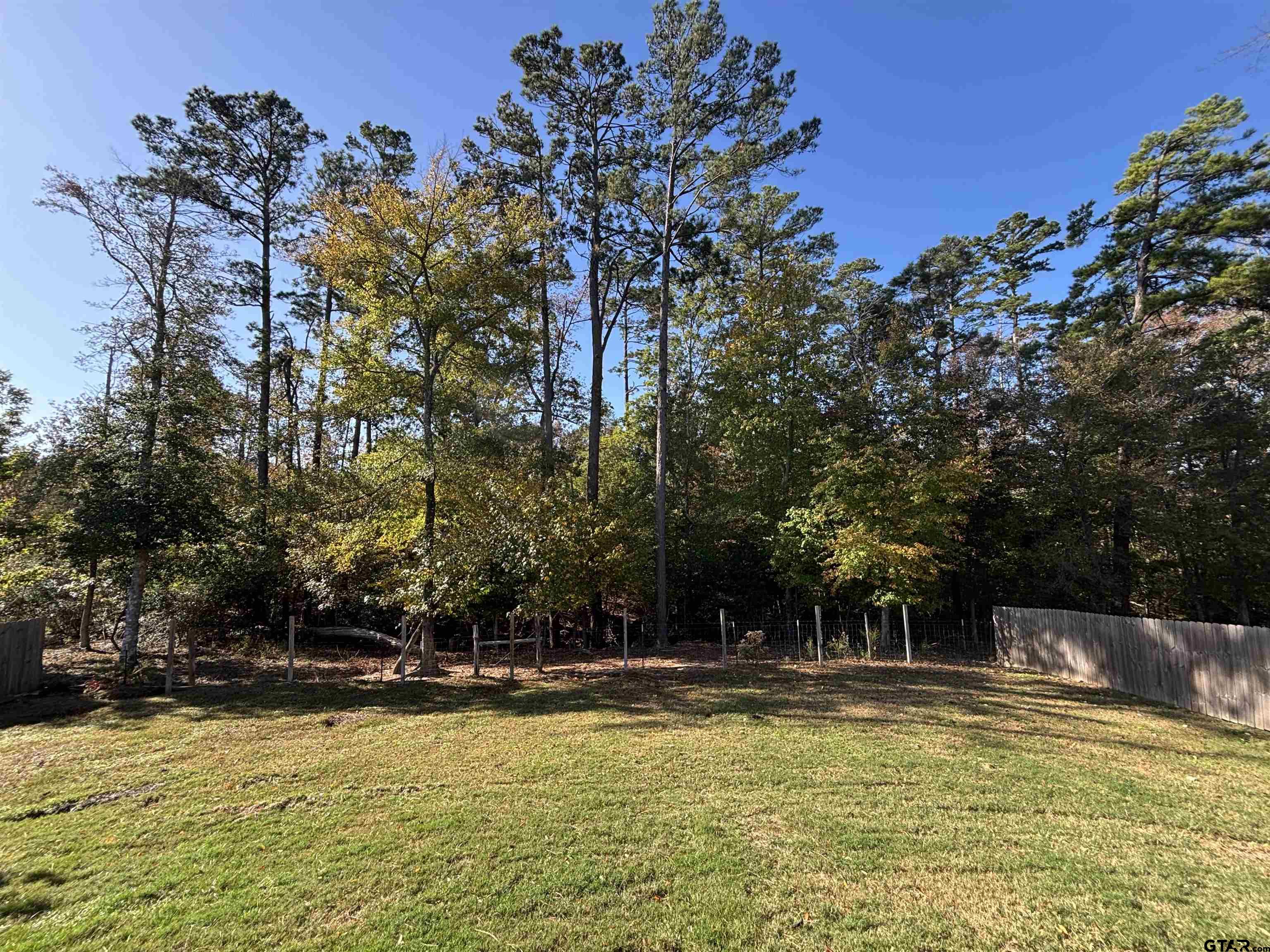 196 Twisted Oaks Road Rusk, TX 75785 - Photo 22 of 25 a view of swimming pool with outdoor seating and trees