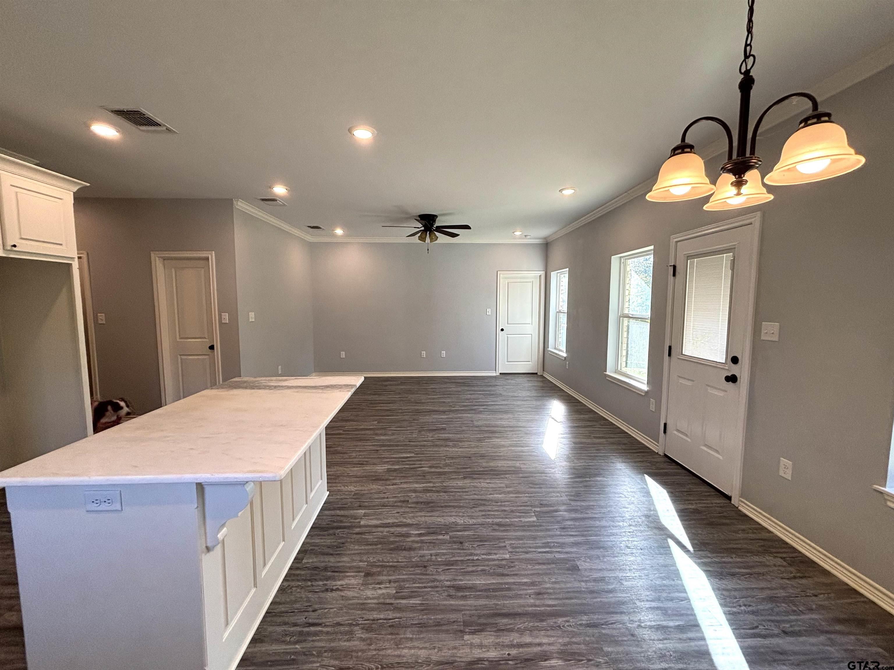 196 Twisted Oaks Road Rusk, TX 75785 - Photo 4 of 25 a view of a hallway with wooden floor