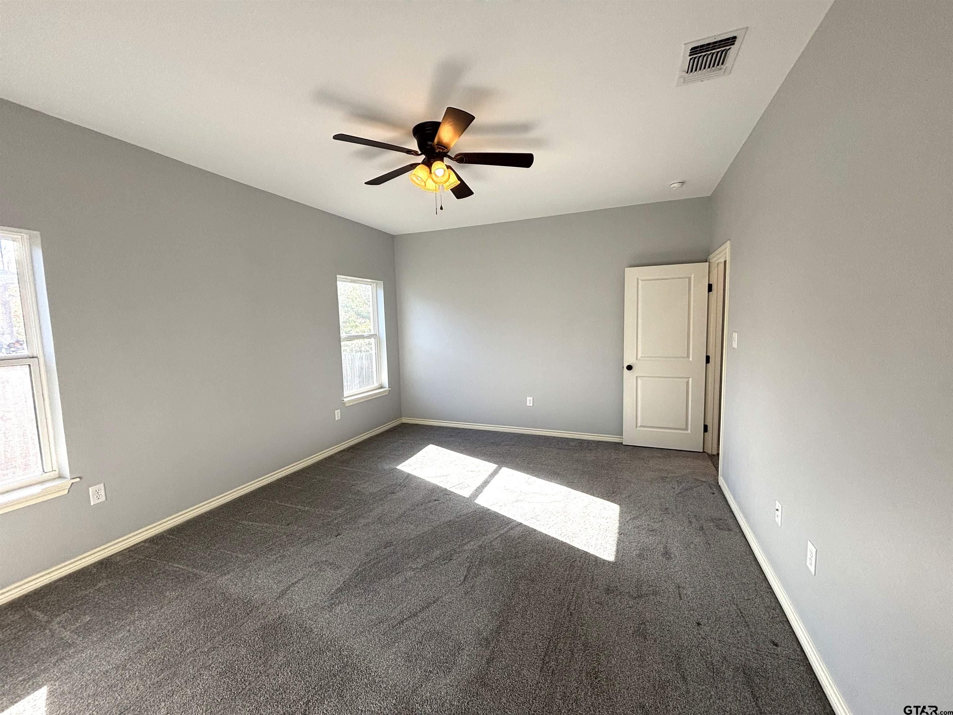 196 Twisted Oaks Road Rusk, TX 75785 - Photo 9 of 25 a view of an empty room with a window