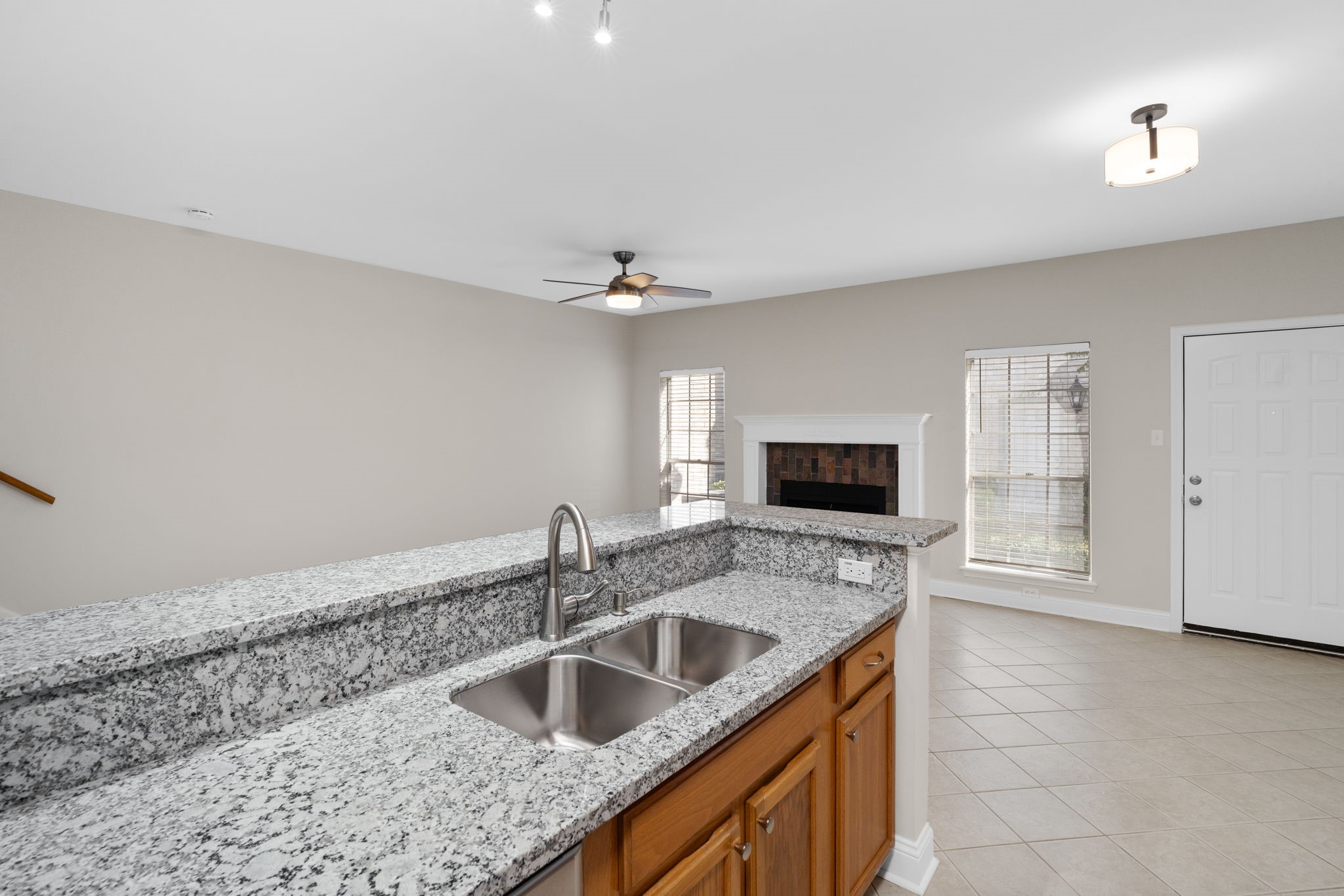7392 Regency Square Court, Unit 7392 Houston, TX 77036 - Photo 10 of 32 The perfectly positioned sink allows the cook to engage with friends and family while preparing meals.