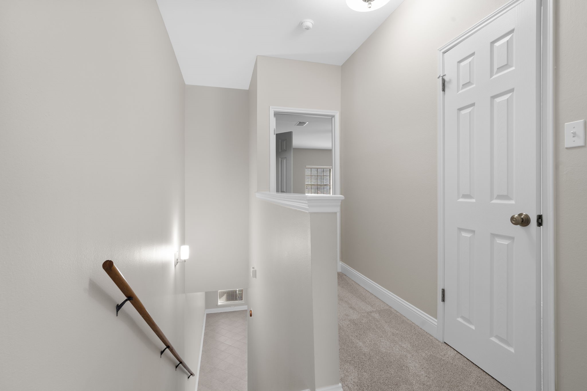 7392 Regency Square Court, Unit 7392 Houston, TX 77036 - Photo 17 of 32 The spacious upstairs hallway offers a large walk-in closet with built-in shelves.