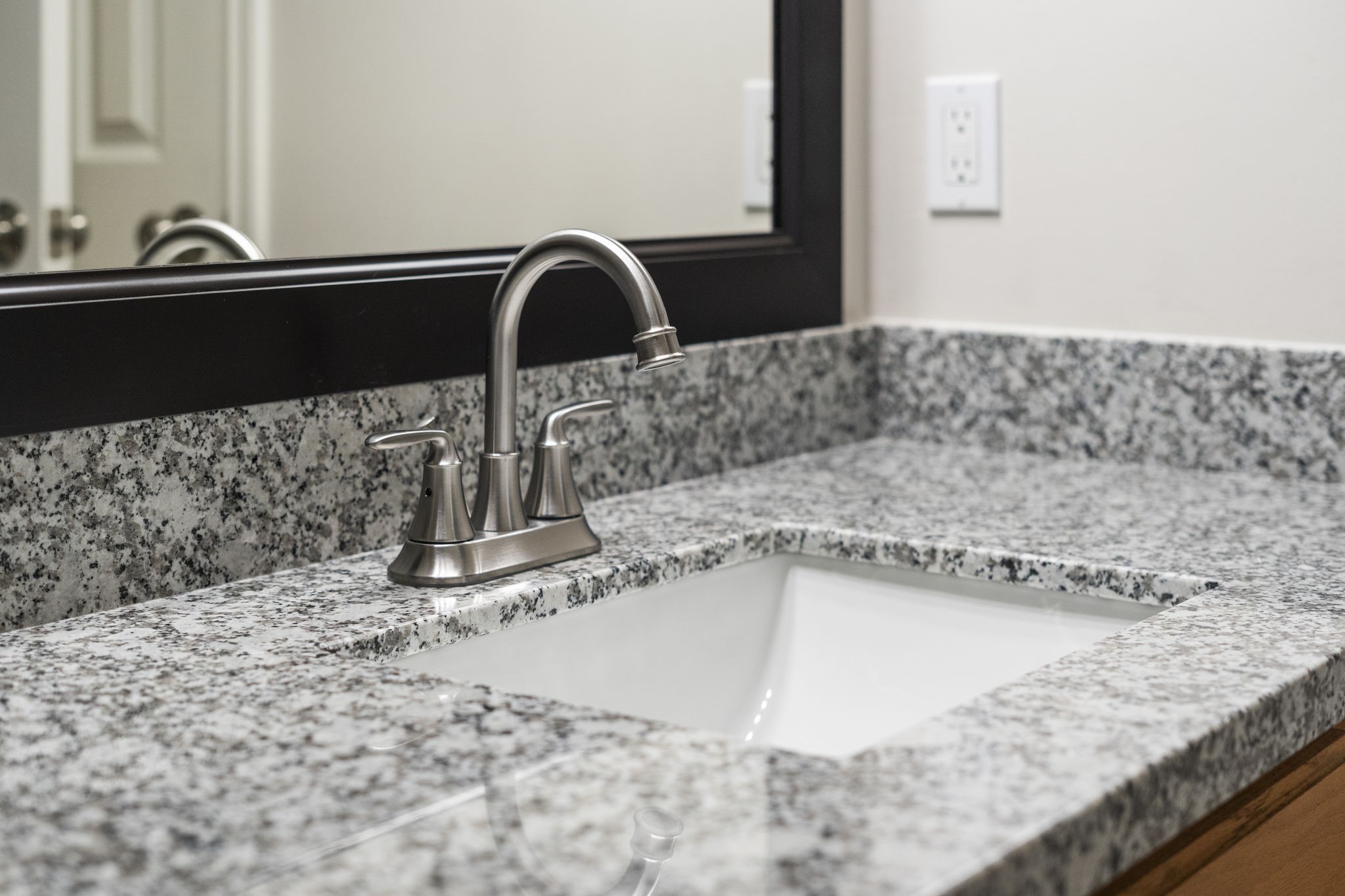 7392 Regency Square Court, Unit 7392 Houston, TX 77036 - Photo 22 of 32 New fixtures, granite countertop, and under-mount sink.