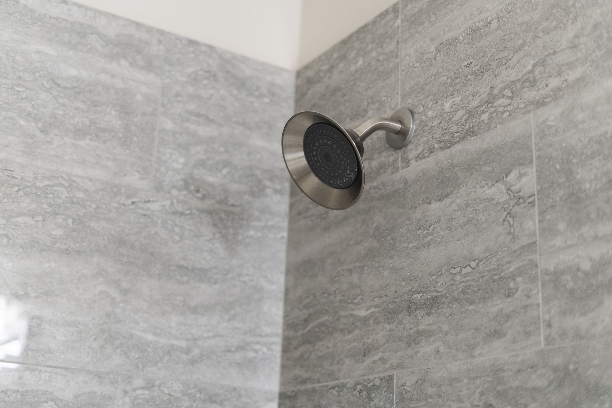 7392 Regency Square Court, Unit 7392 Houston, TX 77036 - Photo 23 of 32 Rain shower head delivers a soothing, full-coverage spray for ultimate relaxation.