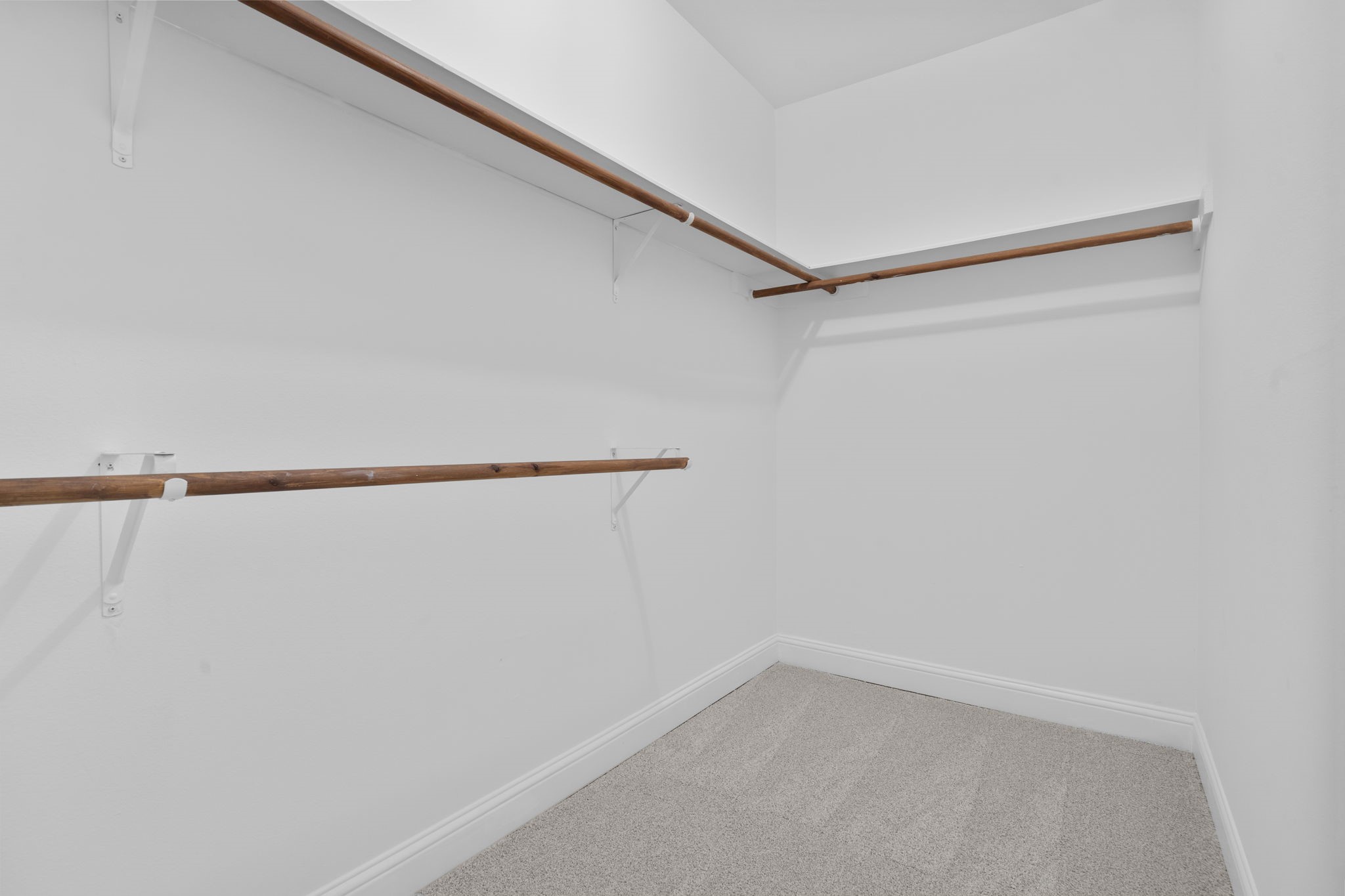 7392 Regency Square Court, Unit 7392 Houston, TX 77036 - Photo 26 of 32 Generous walk-in closet offers ample storage and organization space.