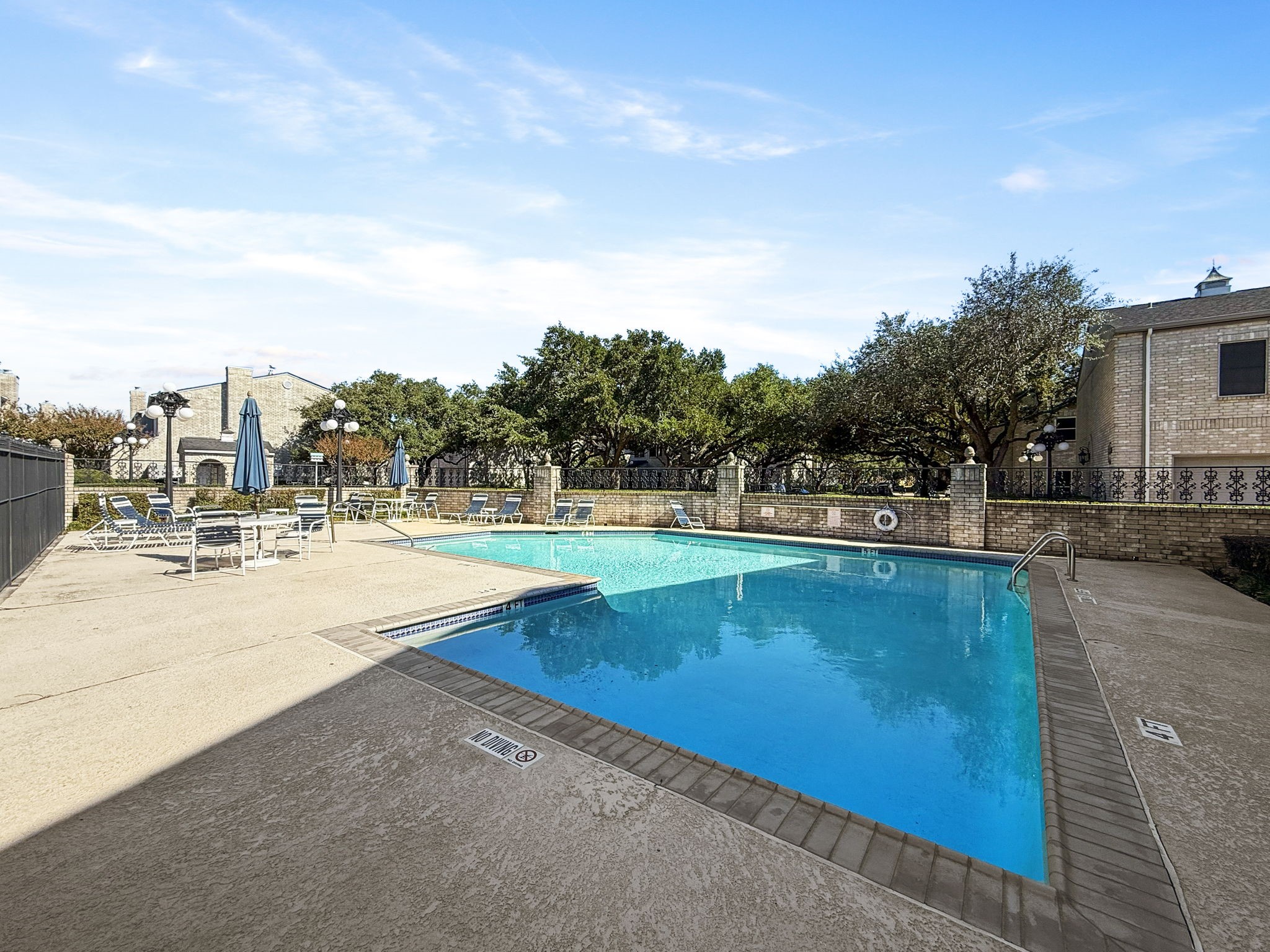 7392 Regency Square Court, Unit 7392 Houston, TX 77036 - Photo 3 of 32 Fantastic location just steps from the Regency Court community pool.