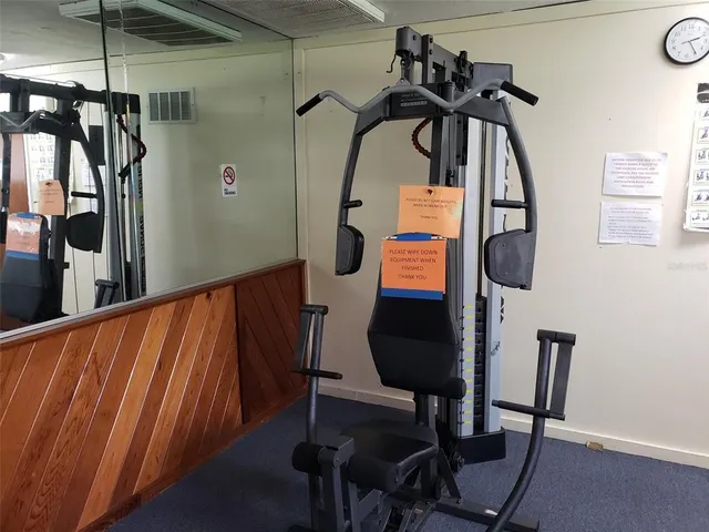 a bedroom with table and chairs