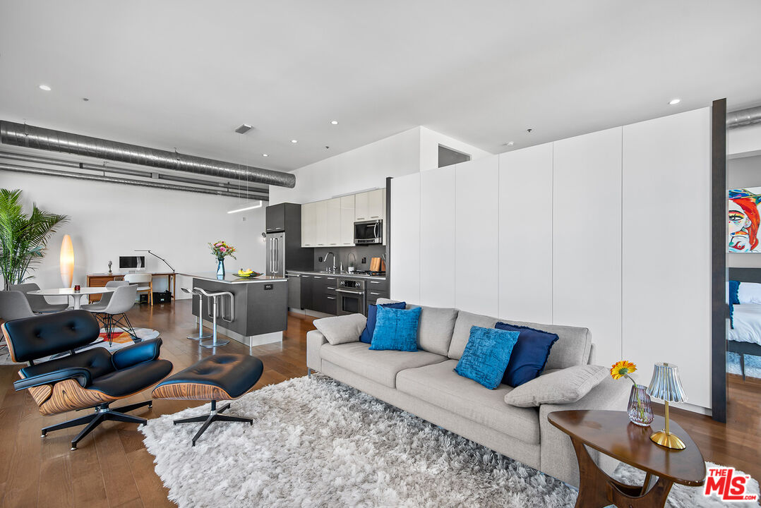 13320 Beach Avenue, Unit 304 Marina del Rey, CA 90292 - Photo 10 of 25 a view of a livingroom with workspace and a couch