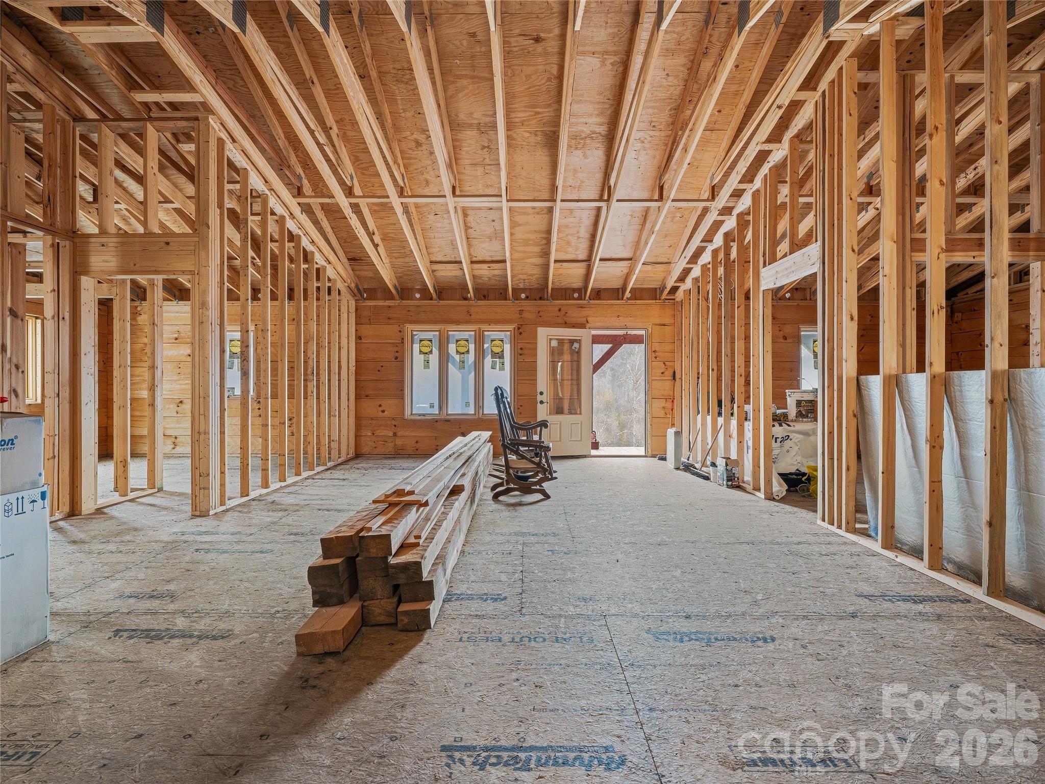 182 Whittemore Branch Road Barnardsville, NC 28709 - Photo 17 of 46 a view of a livingroom with furniture and staircase