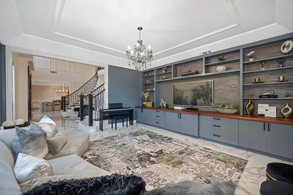 a living room with furniture and a table