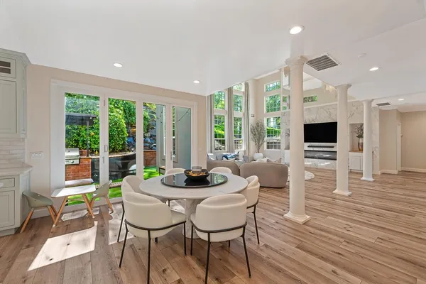 a kitchen with a sink and large window