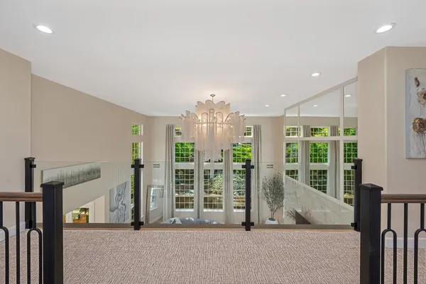 a bathroom with a shower sink and mirror