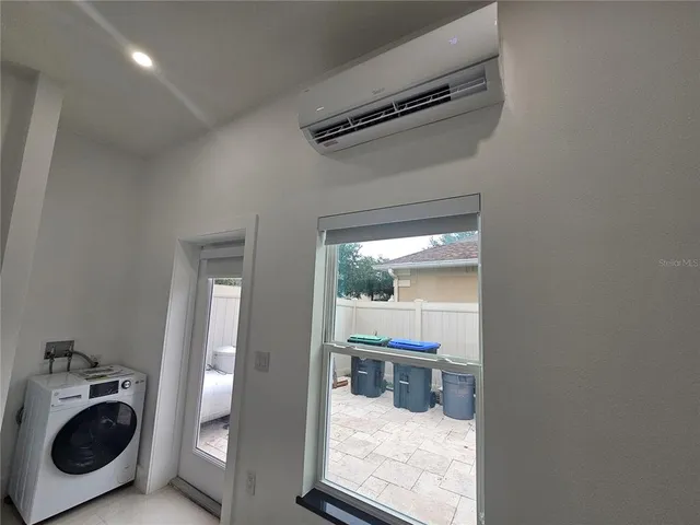 view of living room with washer and dryer