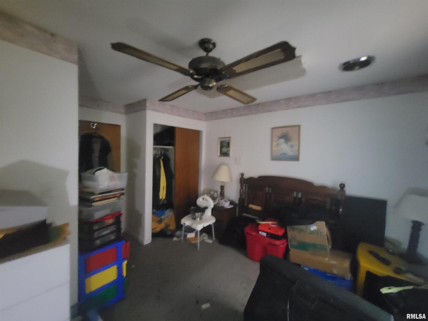 905 West Monroe Street Herrin, IL 62948 - Photo 12 of 14 a living room with furniture and a flat screen tv